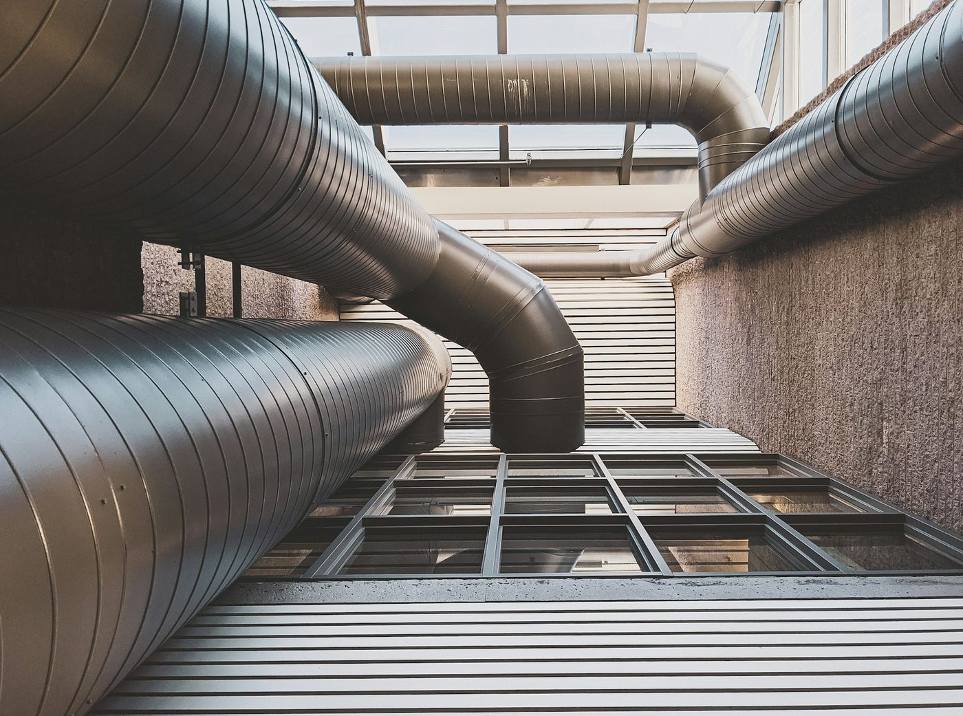 Ventilation ducts running through a building's technical floor
