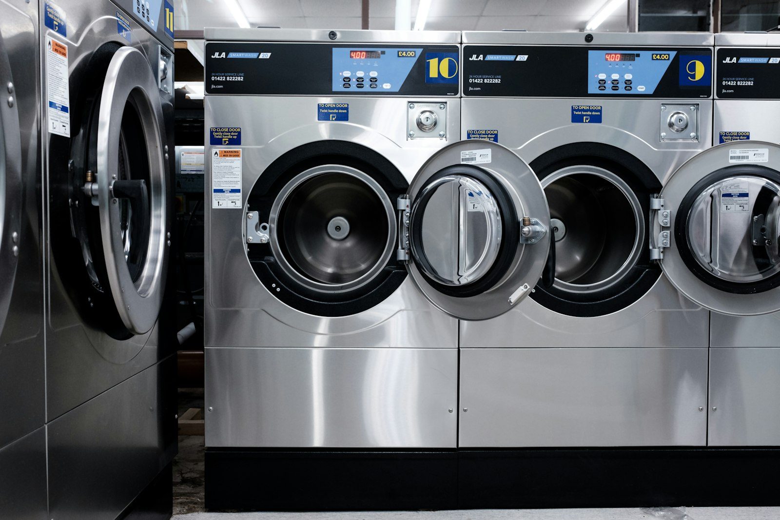 Row of front-load washing machines