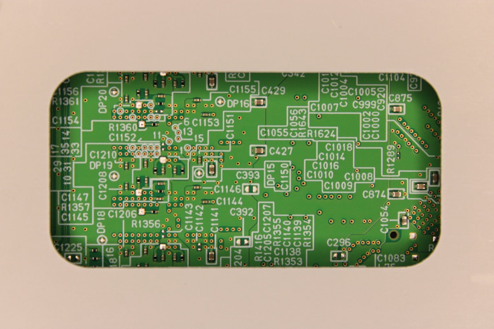 Close-up of a populated green circuit board